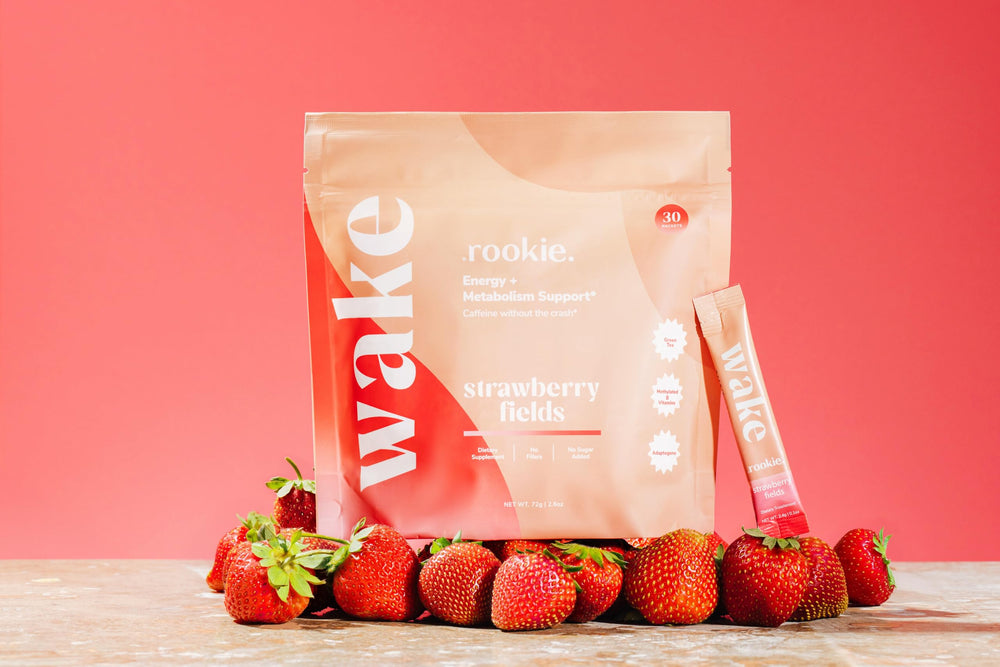 Scoop of Strawberry Fields powder being poured