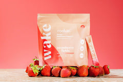 Scoop of Strawberry Fields powder being poured
