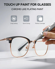 Close-up of repair pen tip applying color to metal frame