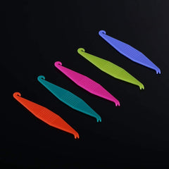 Multi-color disposable orthodontic elastic placers displayed