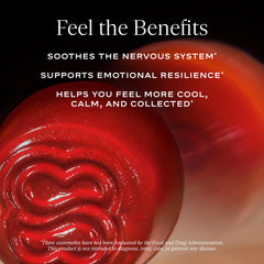 Open bottle with gummies spilling onto white surface