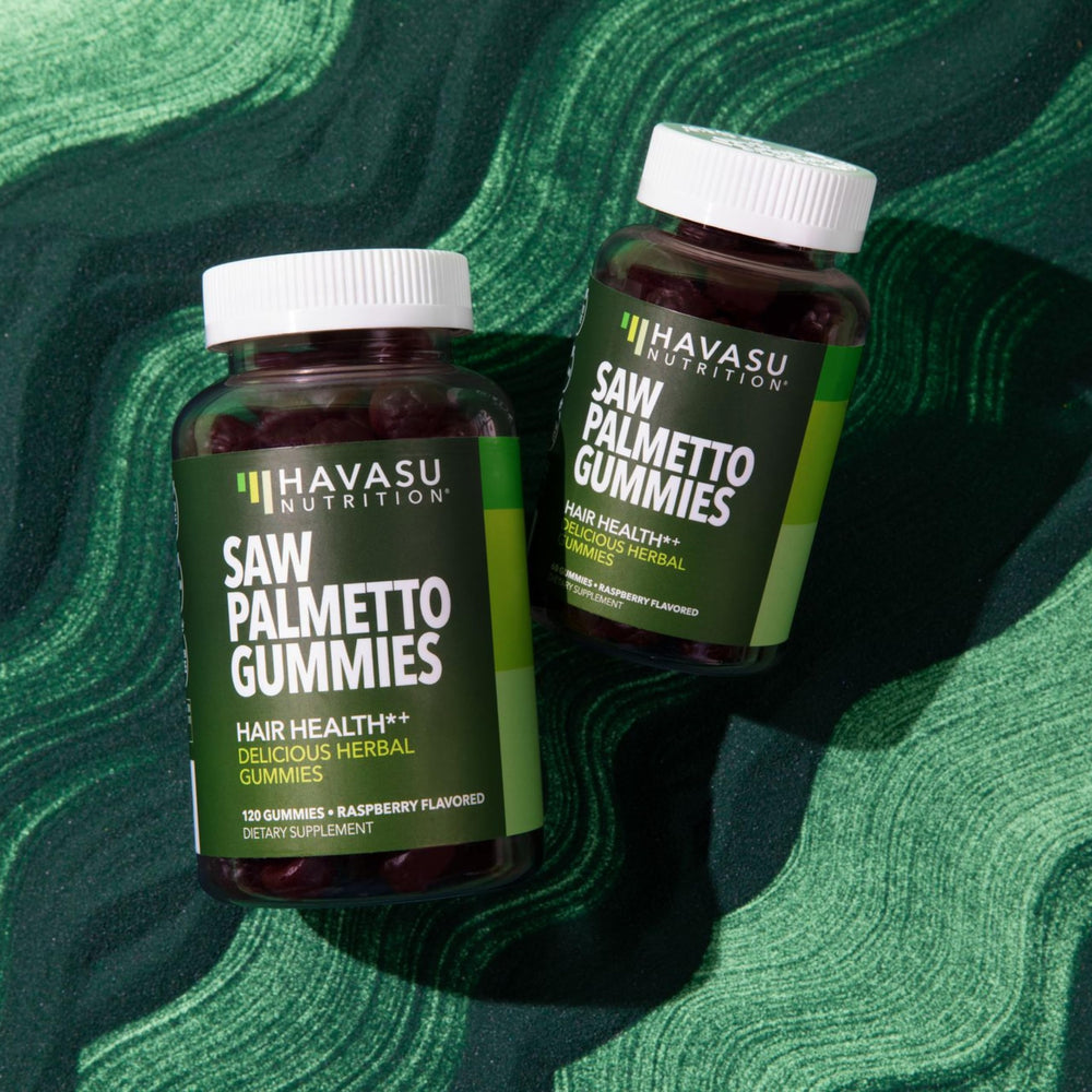 Lifestyle shot of a man taking a gummy supplement
