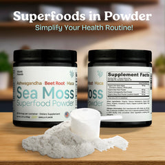 Scooping sea moss powder with ashwagandha, beet root, and maca into a glass
