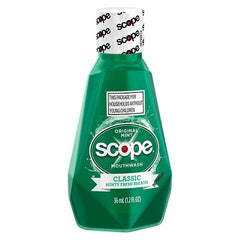 Close-up of Scope Mouthwash Classic Original Mint travel-size bottles (1.2 oz) in packaging