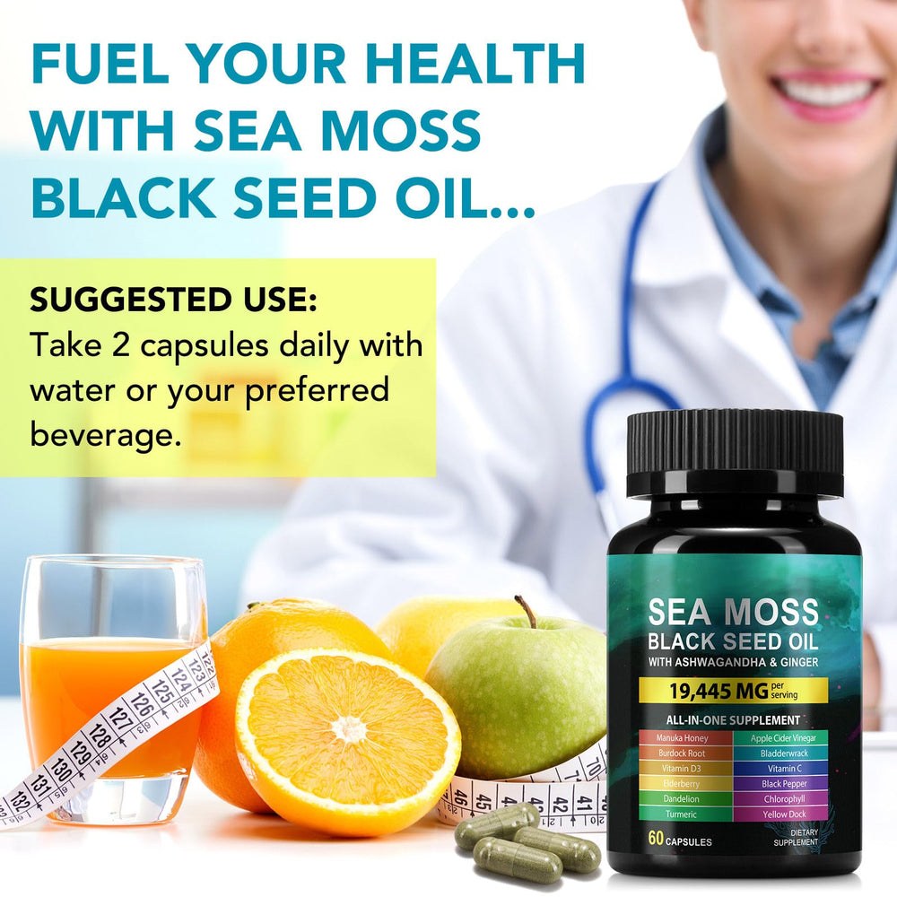 Two capsules resting on a white surface with herbs