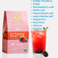 Cup of hot Secrets Of Tea Fertility Tea for Women being poured