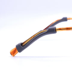 Wearer wearing glasses with comfort temple tips