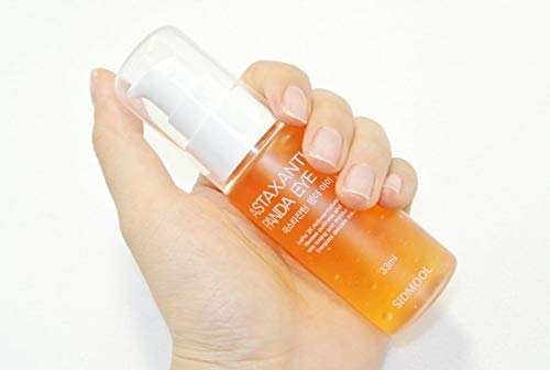 Dropper dispensing serum onto skin