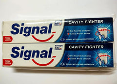 Packaging image showing two toothpaste boxes and tubes