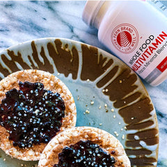 Brand graphics highlighting whole food, vegan, and non-GMO formula