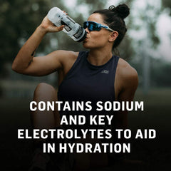 Compact SIS Hydro tube placed beside running shoes for portability