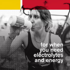 Strawberries and lemons around Skratch Labs Hydration Packets