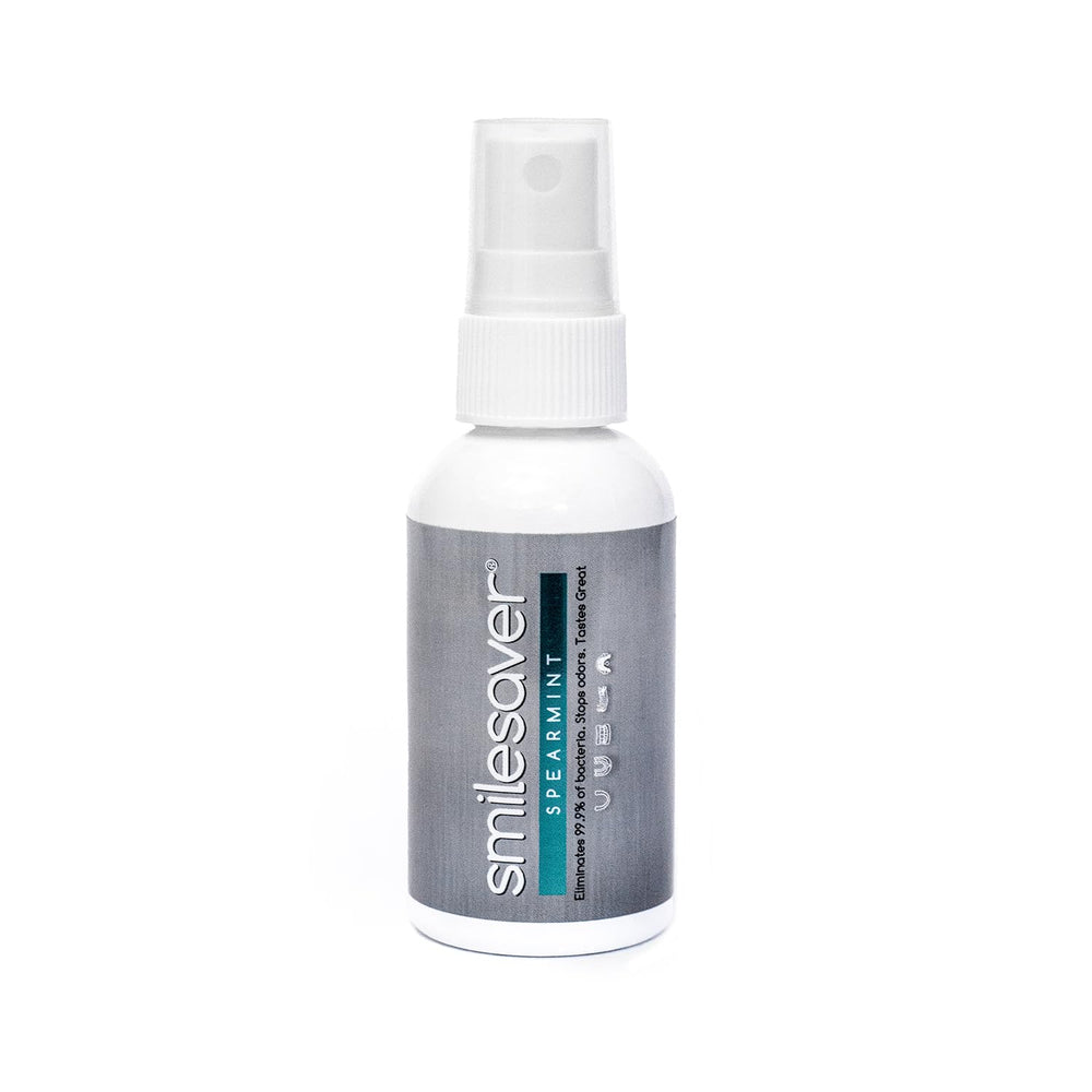 Smilesaver Retainer Cleaner bottle and spray nozzle on white background