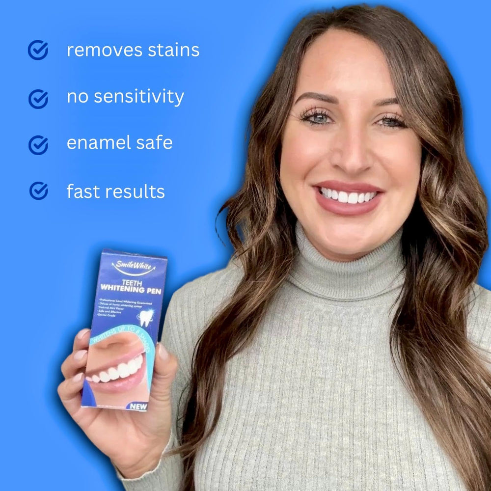 Applying SmileWhite whitening gel to teeth with the pen