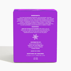 Close-up of SNOW Purple Magic Powder being sprinkled onto toothbrush