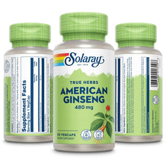 Close-up of ginseng capsules and product bottle