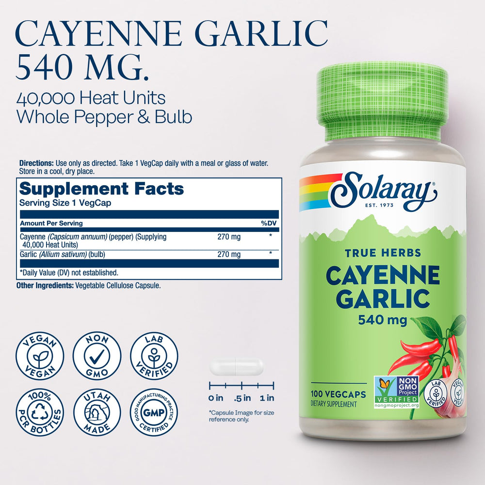 Close-up of cayenne pepper and garlic capsules