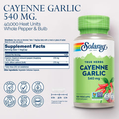 Close-up of cayenne pepper and garlic capsules