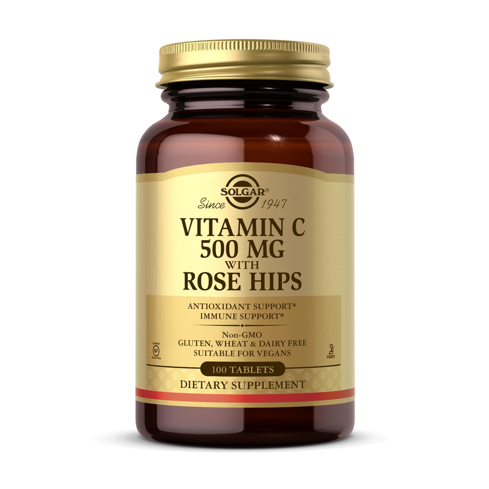 Solgar Vitamin C 500 mg with Rose Hips bottle and tablets on white background