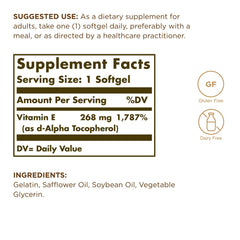 Solgar Vitamin E softgels with d-Alpha Tocopherol close-up highlights oil-based formula for absorption.