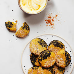 Ingredients include turmeric, ginger, cinnamon, black pepper, cardamom and tulsi