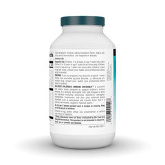 Source Naturals Wellness Children's Immune Chewable Berry wafers on a table for convenient use.