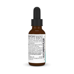 Oregano oil drops dispensed from a dropper