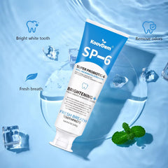 Whitening toothpaste foam on teeth surface