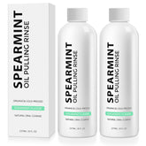 Two bottles of Spearmint Oil Pulling Rinse