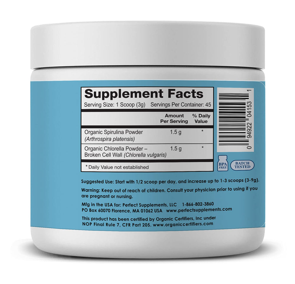 Scoop of spirulina powder on white surface