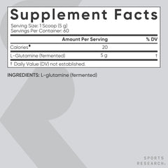L-Glutamine powder being poured into a glass
