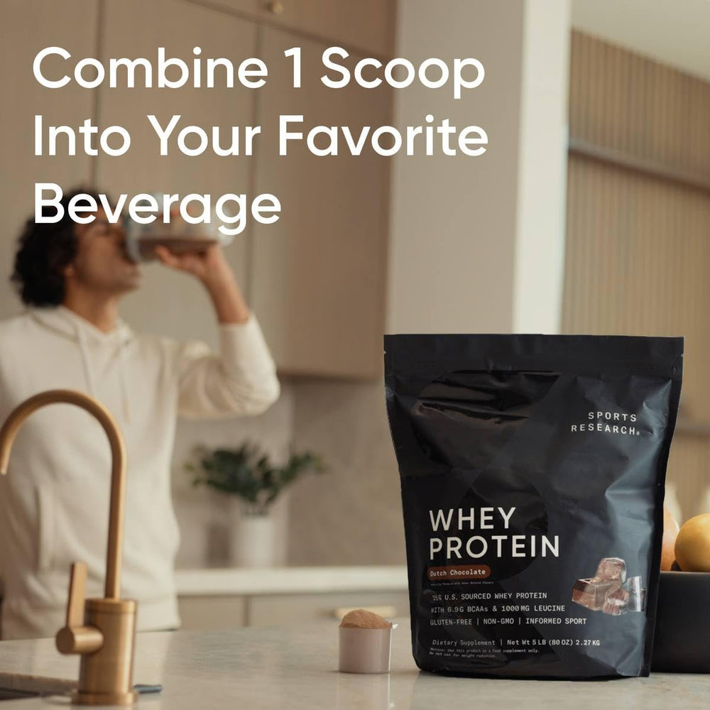 Scooping whey protein powder for shake
