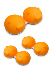 Orange bear-shaped contact lens case with screw-top lid