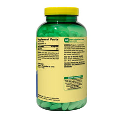 Person using the Spring Valley supplement and pill box