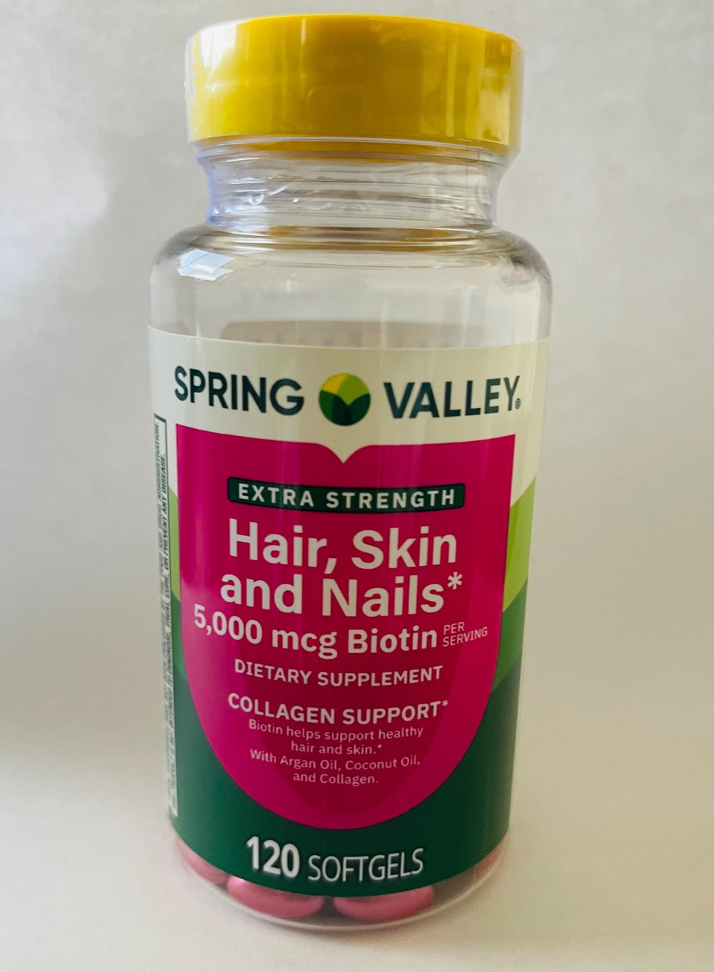 Softgels with ingredients concept for hair, skin and nails including biotin supplement