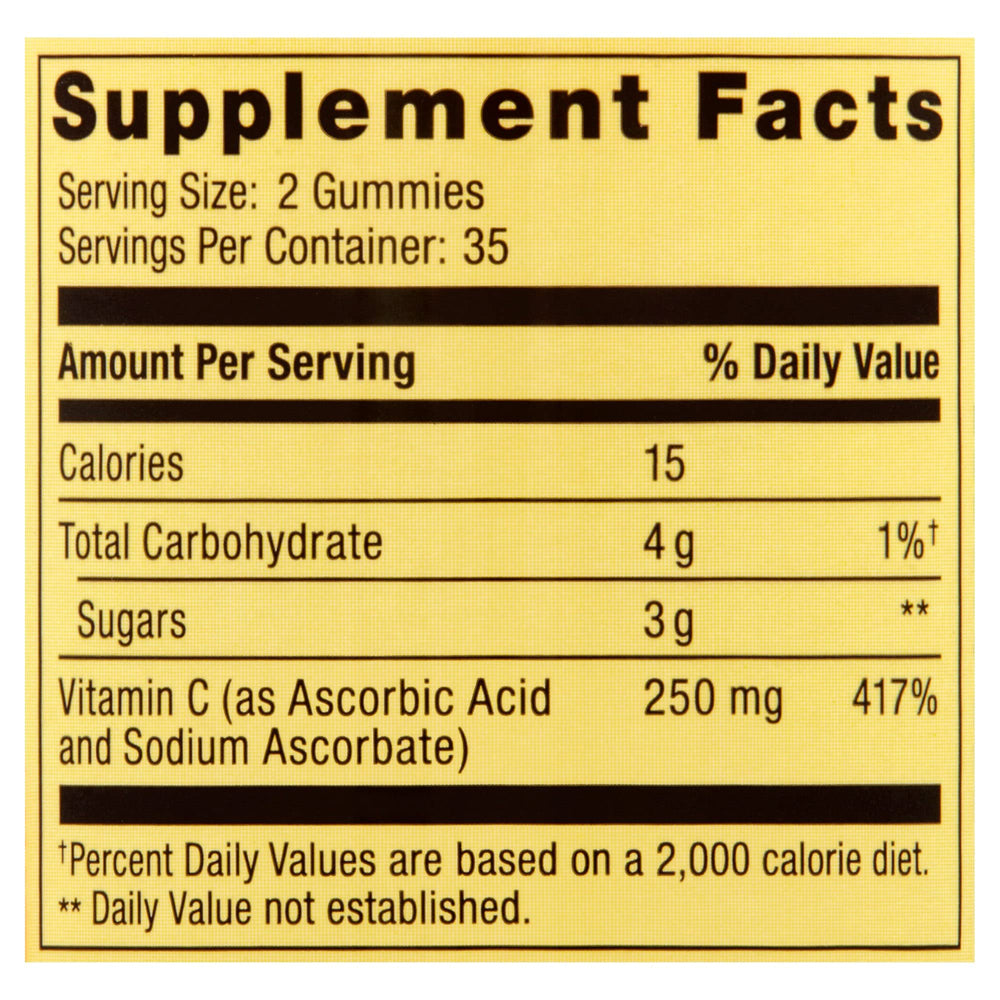 Vitamin C gummies and packaging on a white background