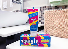 Baby-friendly toothpaste use and safety features of Squigle Jr