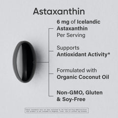 Close-up of a single 6 mg astaxanthin softgel capsule with coconut oil