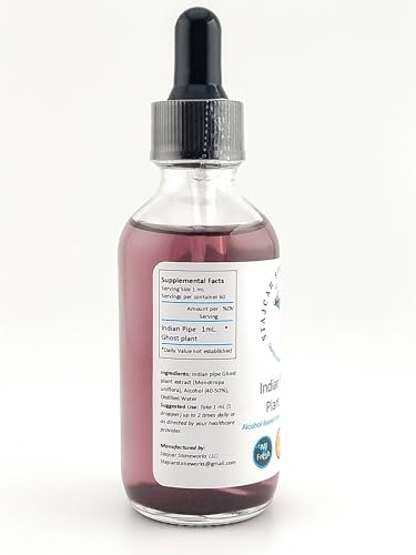 Close-up of amber glass Ghost Plant tincture bottle with label