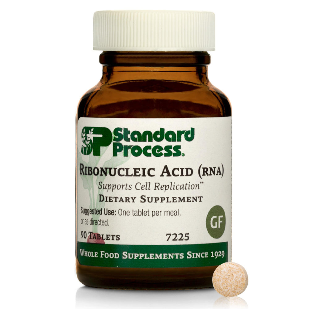 Standard Process RNA tablet close-up showing compact vegan formula aiding cellular growth