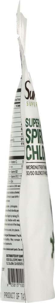 Spirulina and chlorella tablets close-up