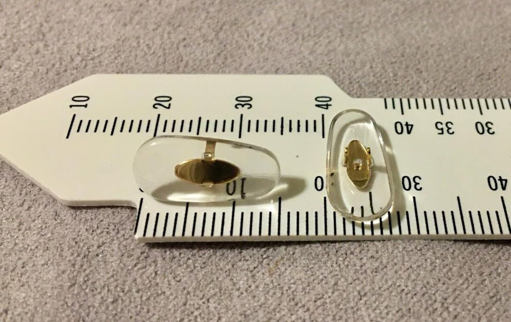 BEHLINE clip-on nose pads attached to eyewear frame, angle view