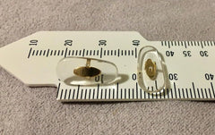 BEHLINE clip-on nose pads attached to eyewear frame, angle view