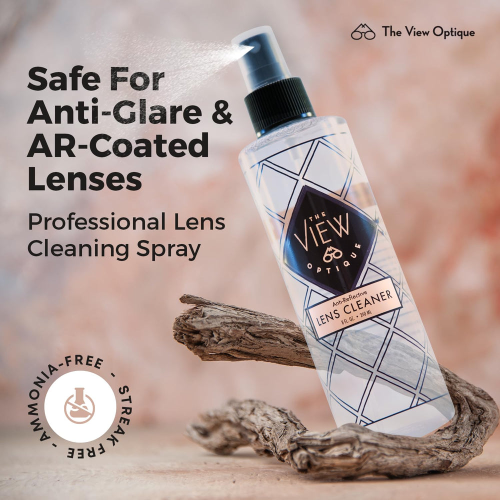 Sunglasses being cleaned with cleaner spray