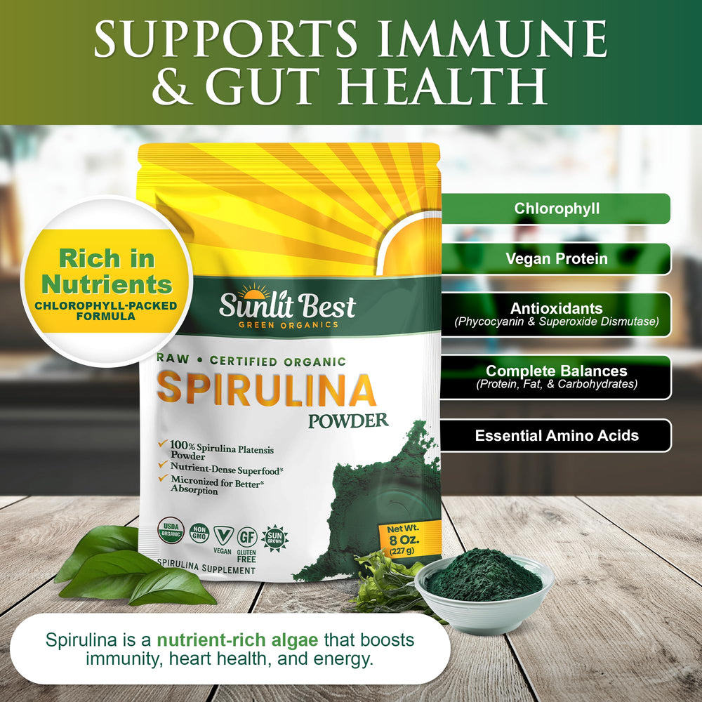 Scoop of organic spirulina powder showing vibrant green color