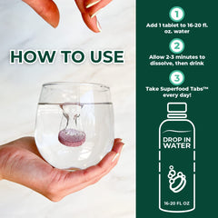 Superfood Tabs mixed-berry glass highlights a refreshing detox drink for digestion.