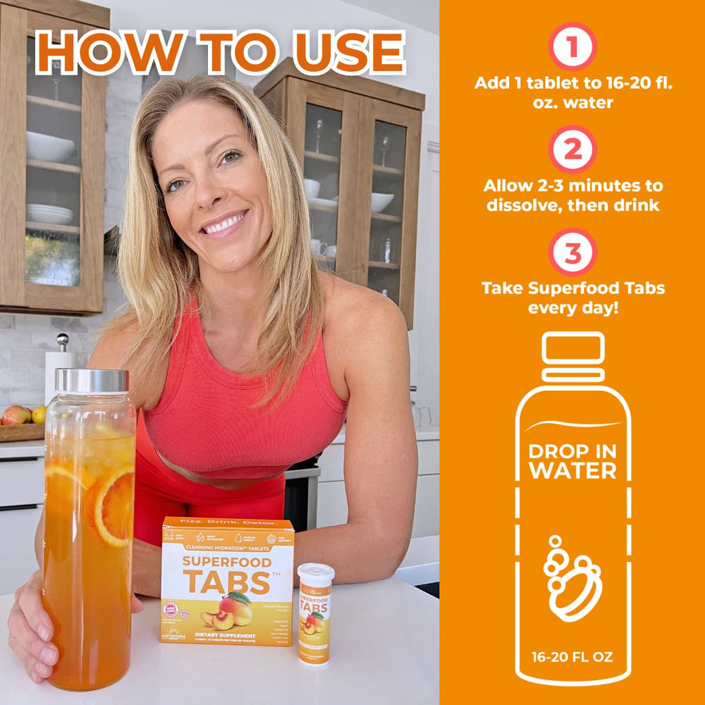 Superfood Tabs Peach Mango dissolving in water into a crisp, energizing drink