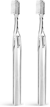 Supersmile Crystal Collection toothbrush with white coral color and 45° angled head