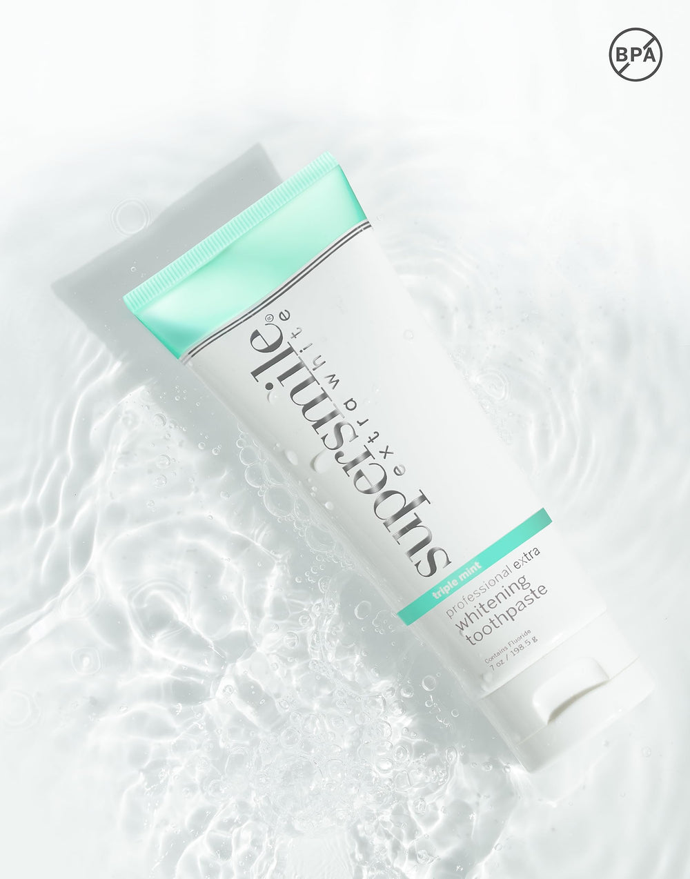 7 oz tube of Supersmile toothpaste on a clean white background