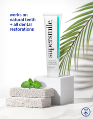 Whitening action and enamel care depicted on toothpaste tube – image 6